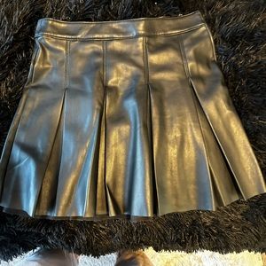 Black leather skater mini skirt